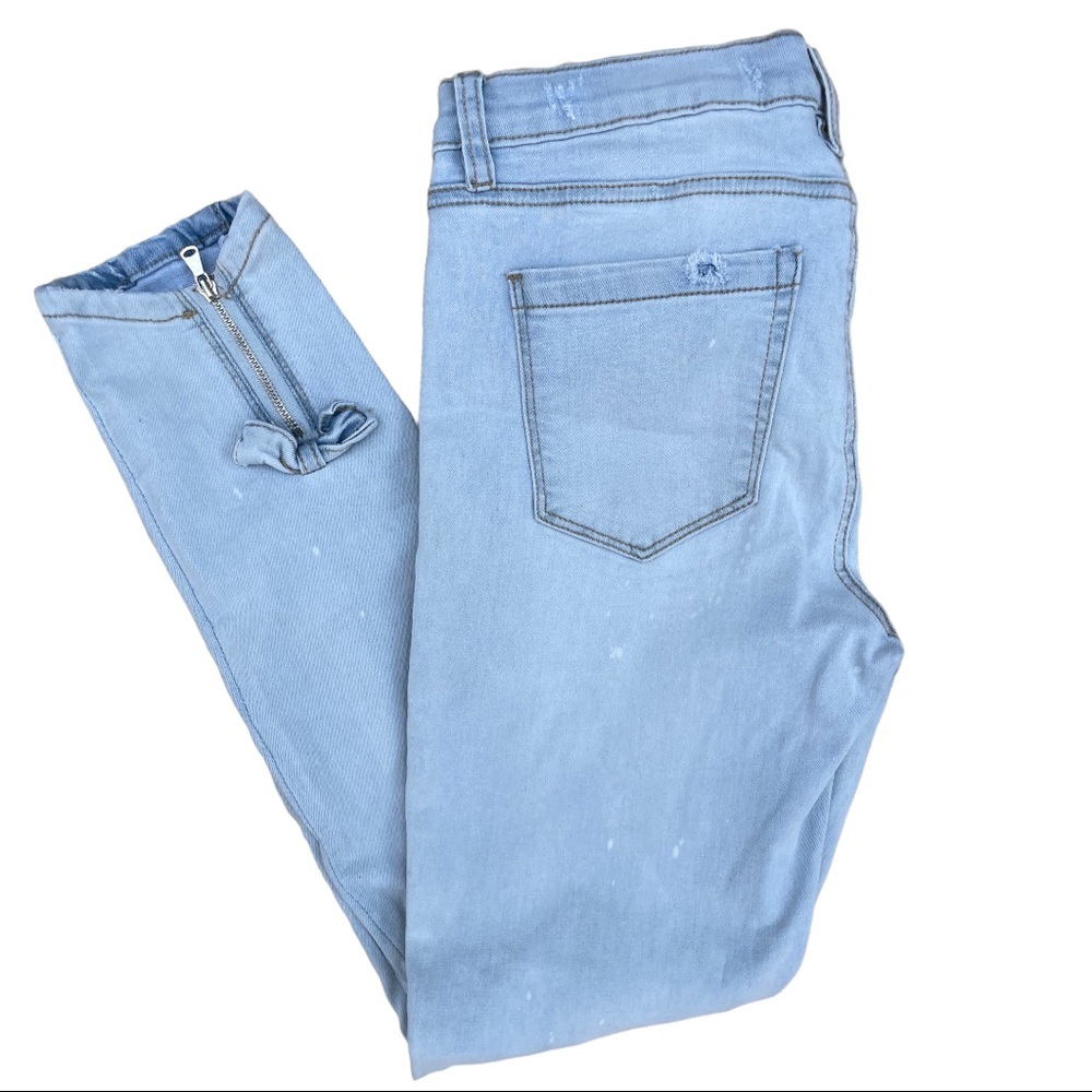 Chelsea & Violet skinny jeans with bowtie detail